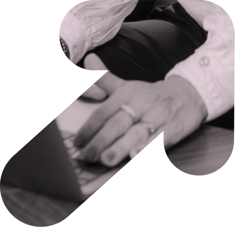 Generic office stock photo in shape of an arrow pointing up.